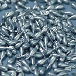 Large pile of ageLOC Tru Face Essence Ultra capsules scattered around.