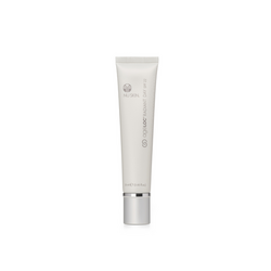 A tube of Transformation Radiant Day Cream displayed on a white backdrop.